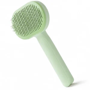 Mint-green cats and dogs grooming slicker brush with fine stainless-steel pins.