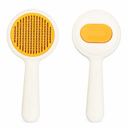 Orange round self-cleaning slicker brush for cats and dogs, front and back view.